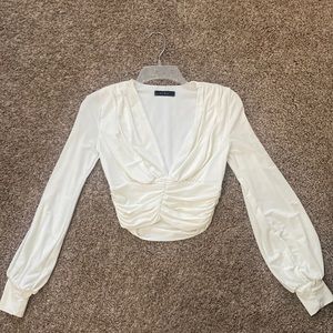 cream saints long sleeve deep v crop top
